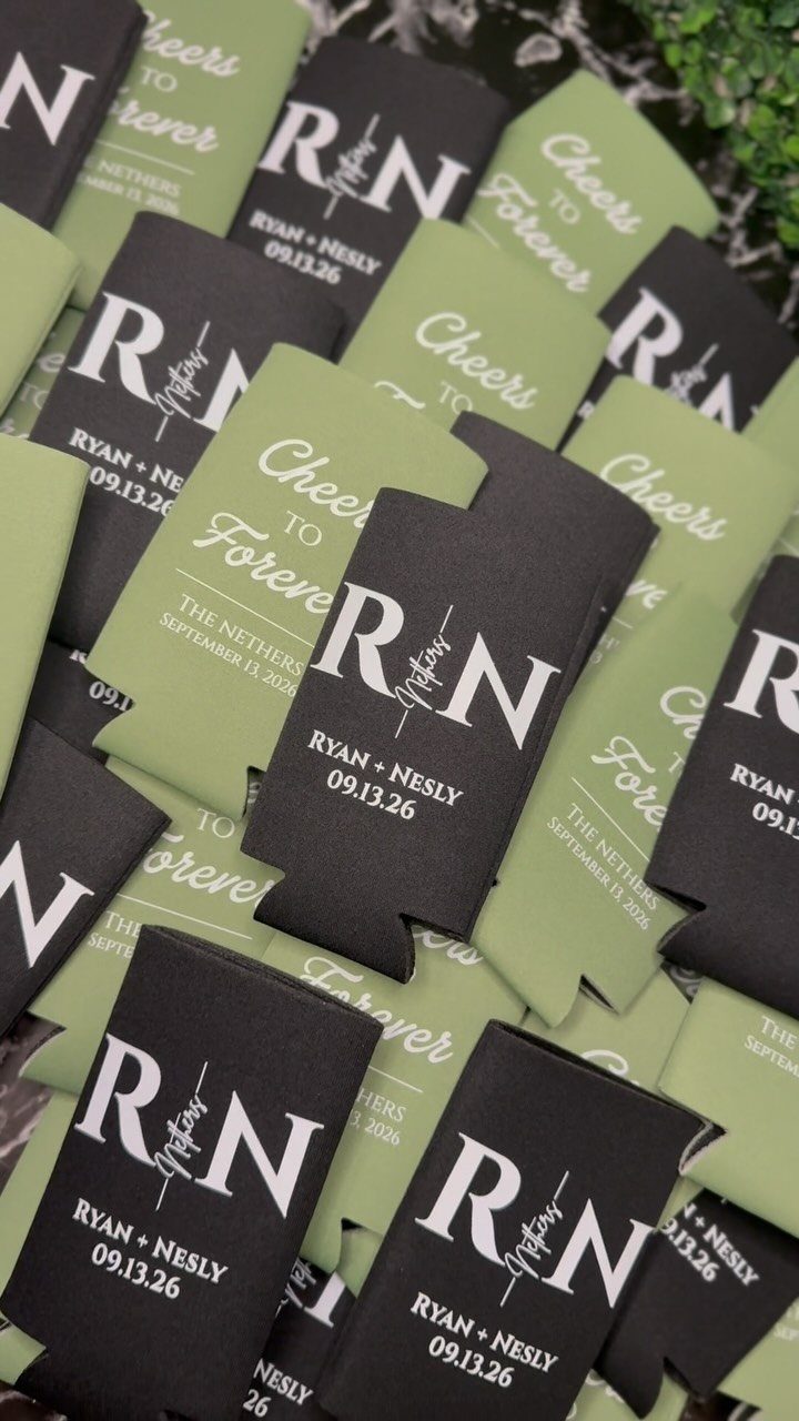 Black and sage green personalized can coolers with white wedding text and initials.