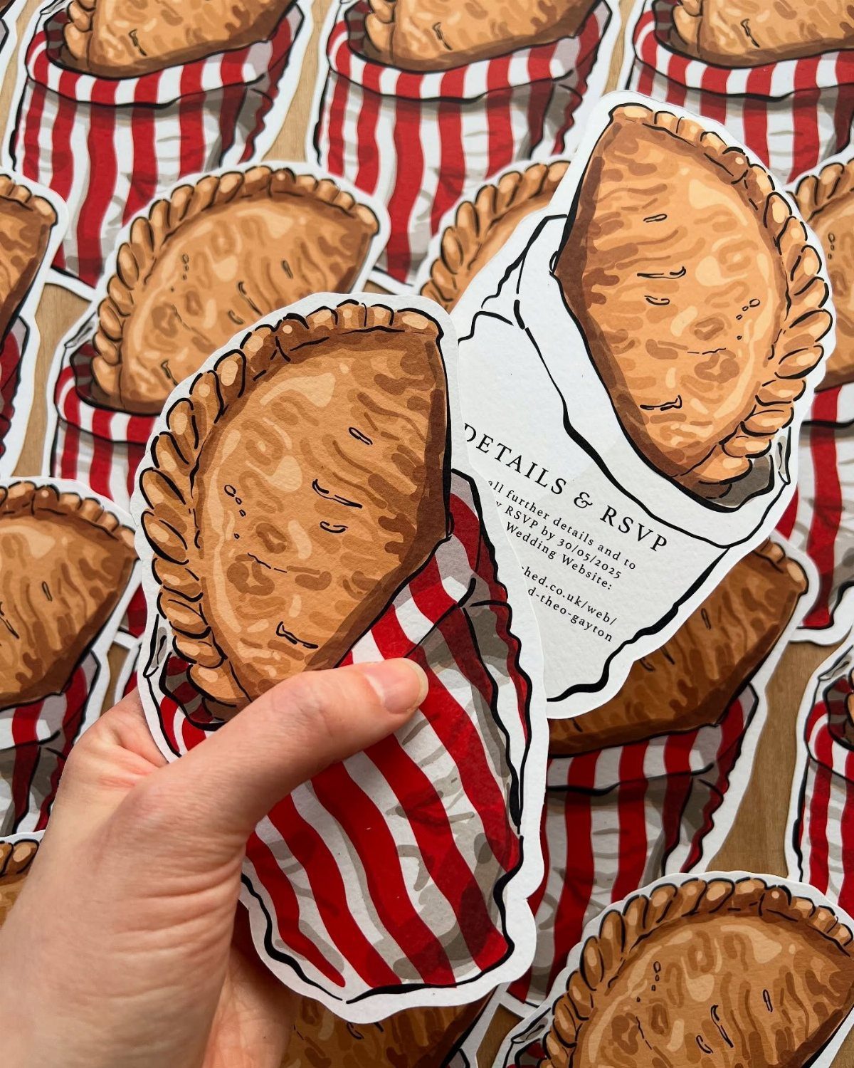Pie-shaped wedding invitation cards featuring illustrations of savory pies in striped bags.
