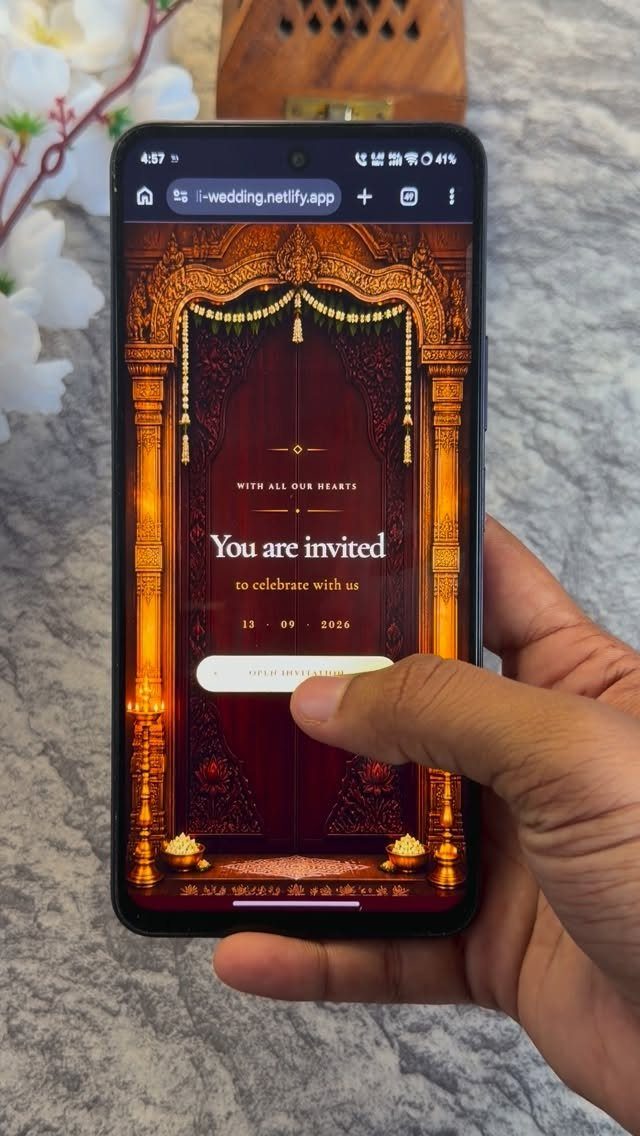 Smartphone screen displaying a digital wedding invitation with a gold ornate archway design.