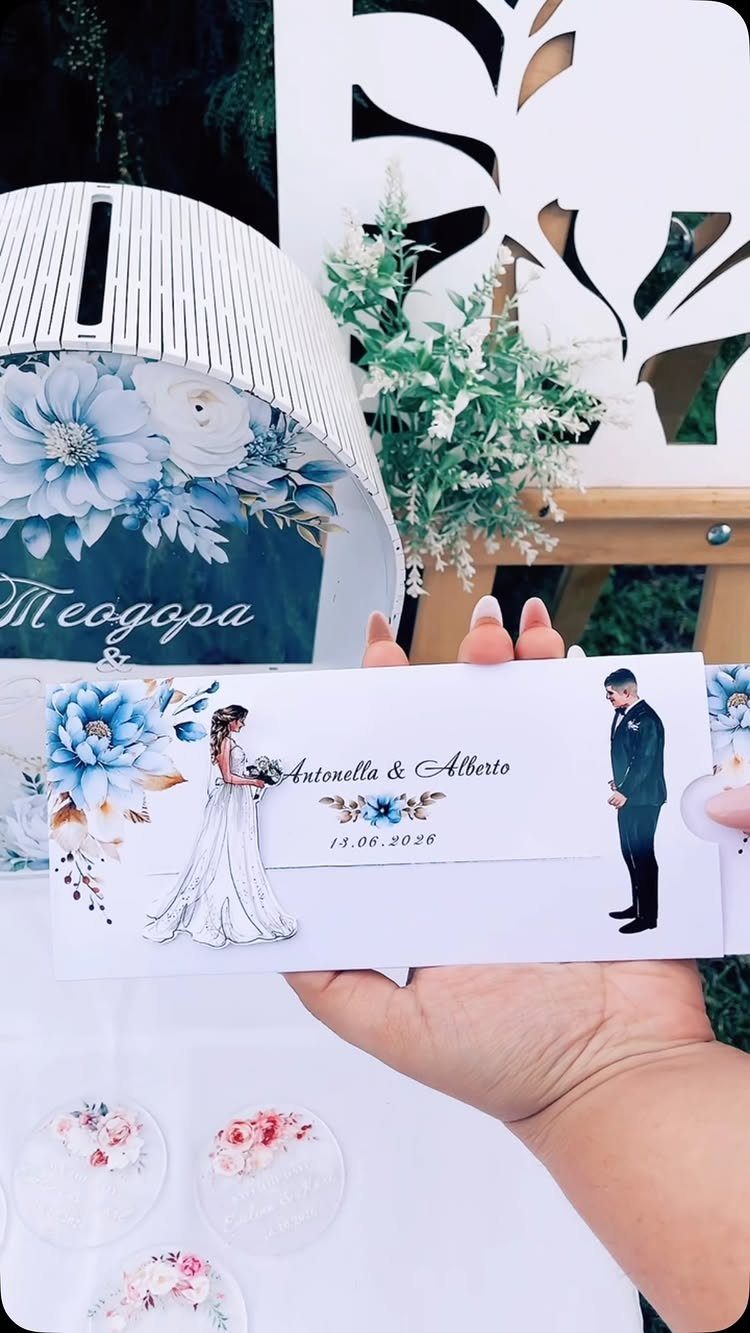 Wedding invitation card with blue floral illustrations and a bride and groom couple.