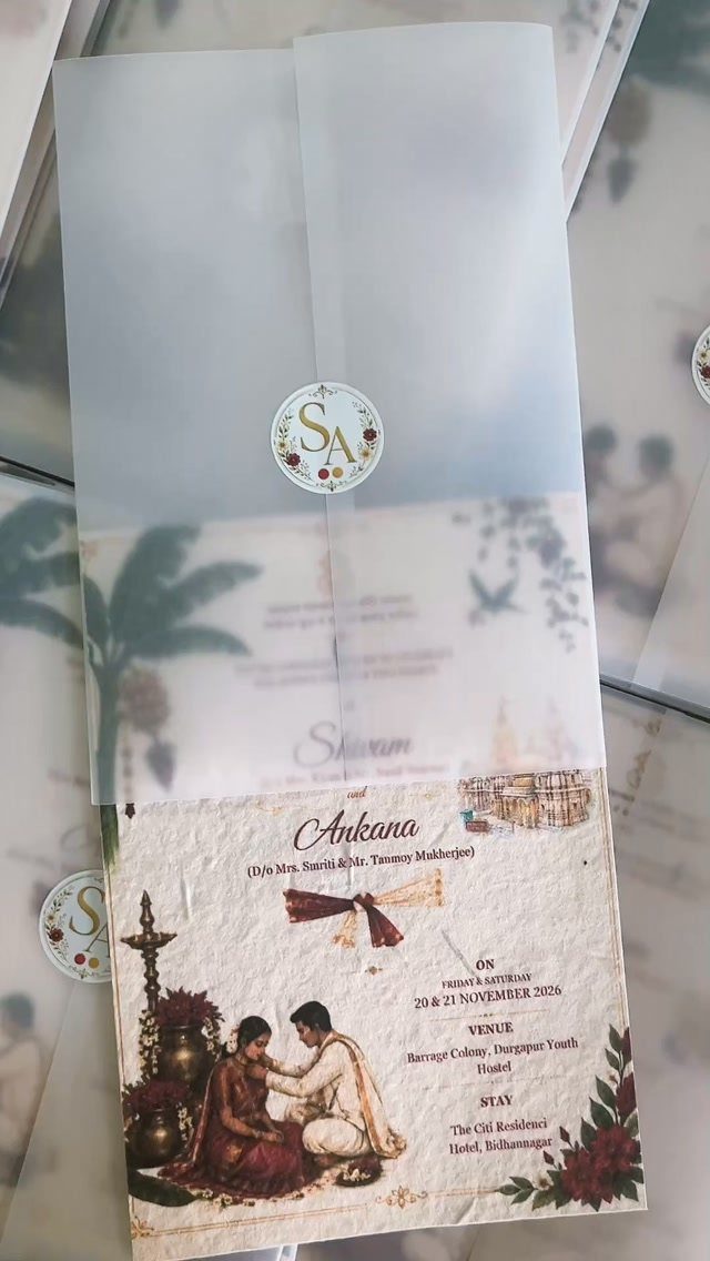 Wedding invitation with traditional Indian couple illustration and a translucent vellum overlay.