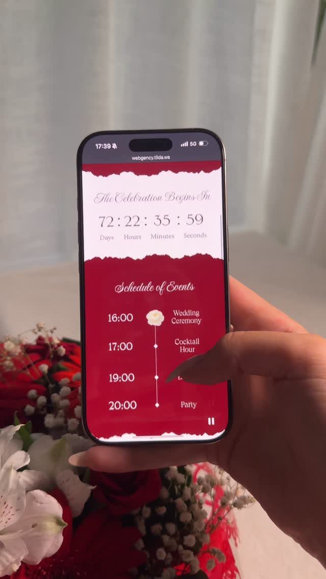 Smartphone screen displaying a red and white digital wedding invitation with event schedule.