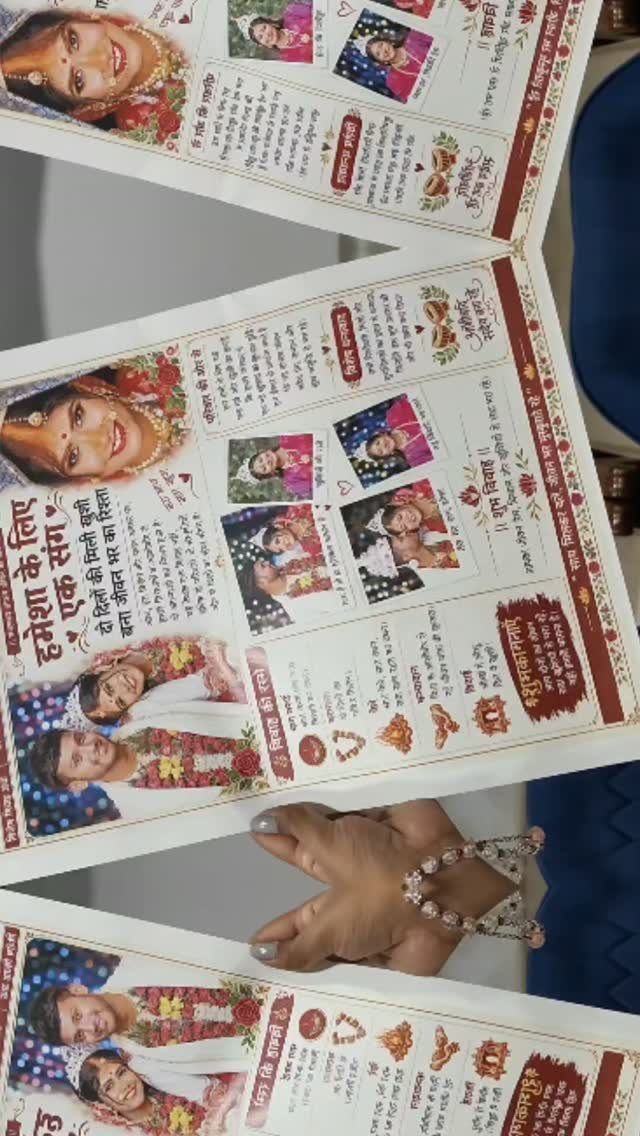Printed wedding newspaper programs featuring couple photos and red decorative accents.