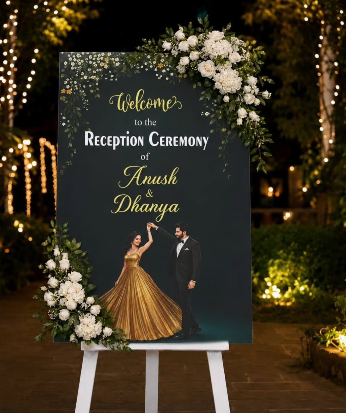Welcome sign for a reception ceremony featuring a couple and white floral decorations.