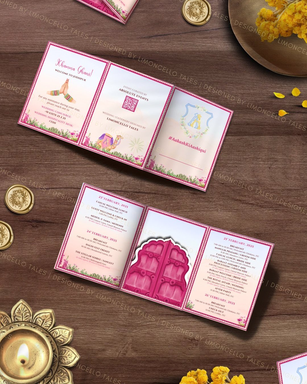 Pink and white wedding itinerary cards with gold accents on a wooden table.