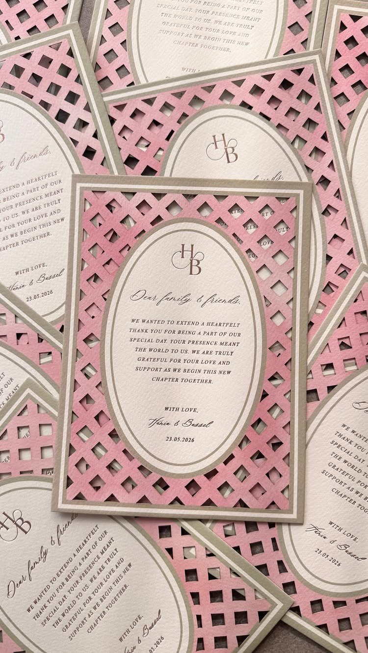 Wedding thank you cards with pink lattice borders and white oval centers.