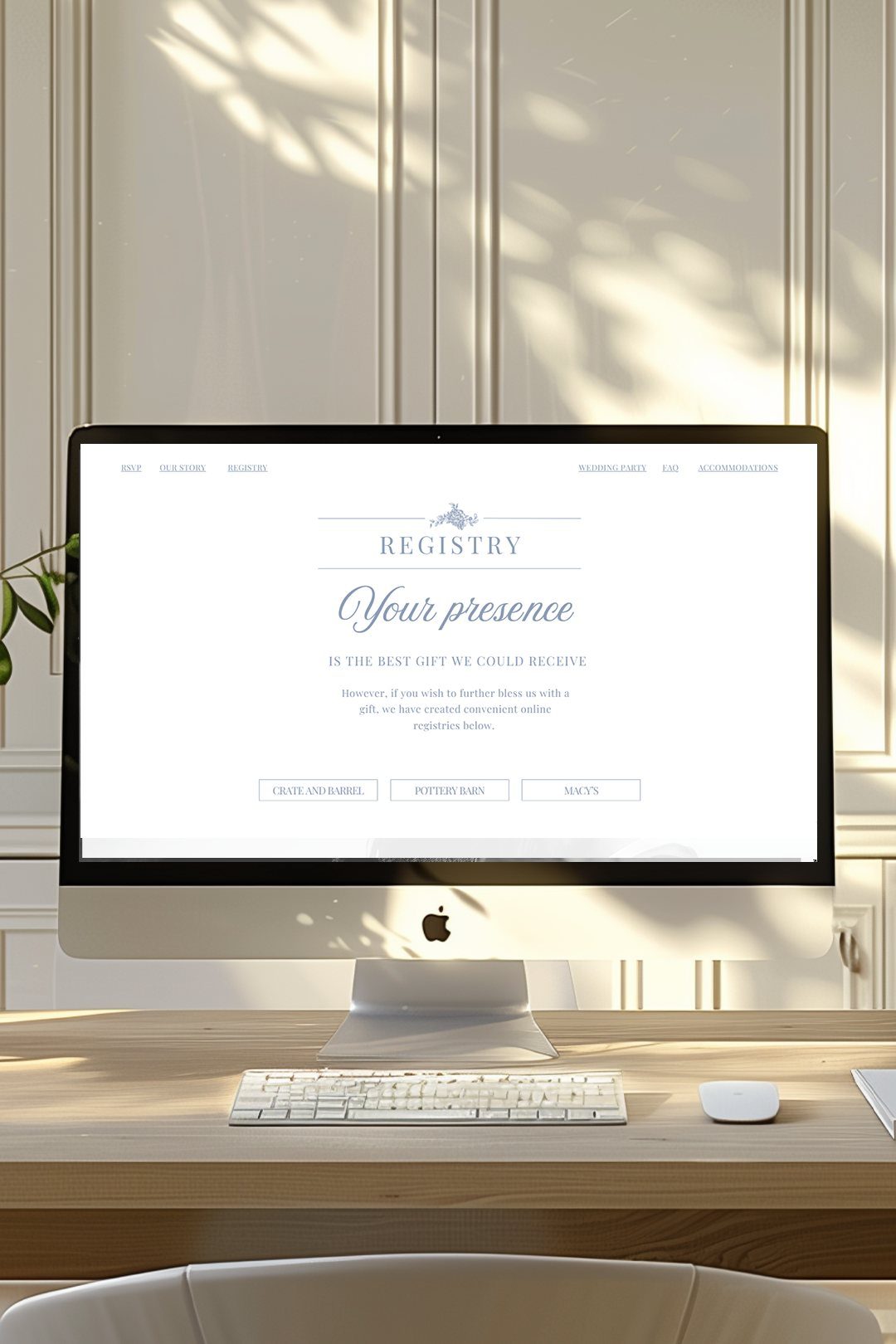 Computer monitor displaying a minimalist wedding registry webpage on a wooden desk.